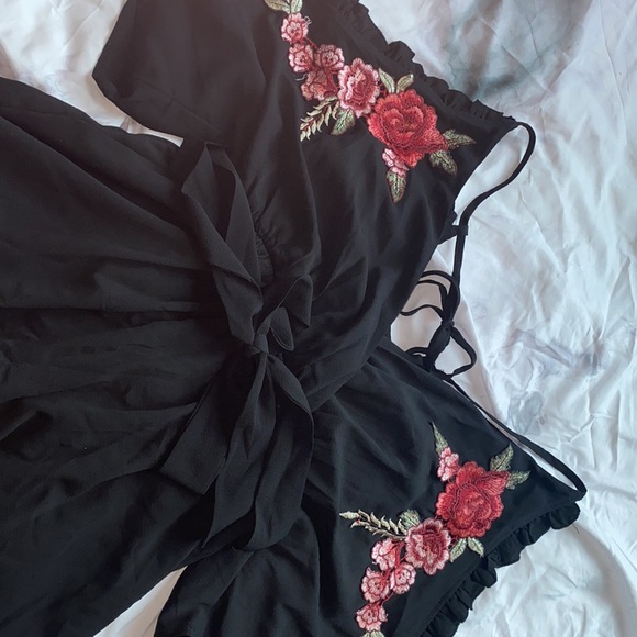 Black Romper With Embodied Rose Accents and Tie - Picture 6 of 7